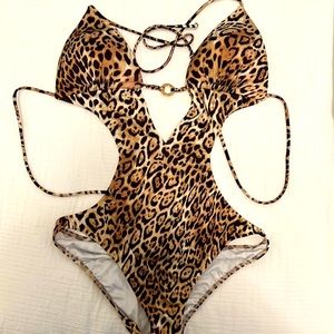 Victoria’s Secret monokini size medium with logo at the front. Leopard print